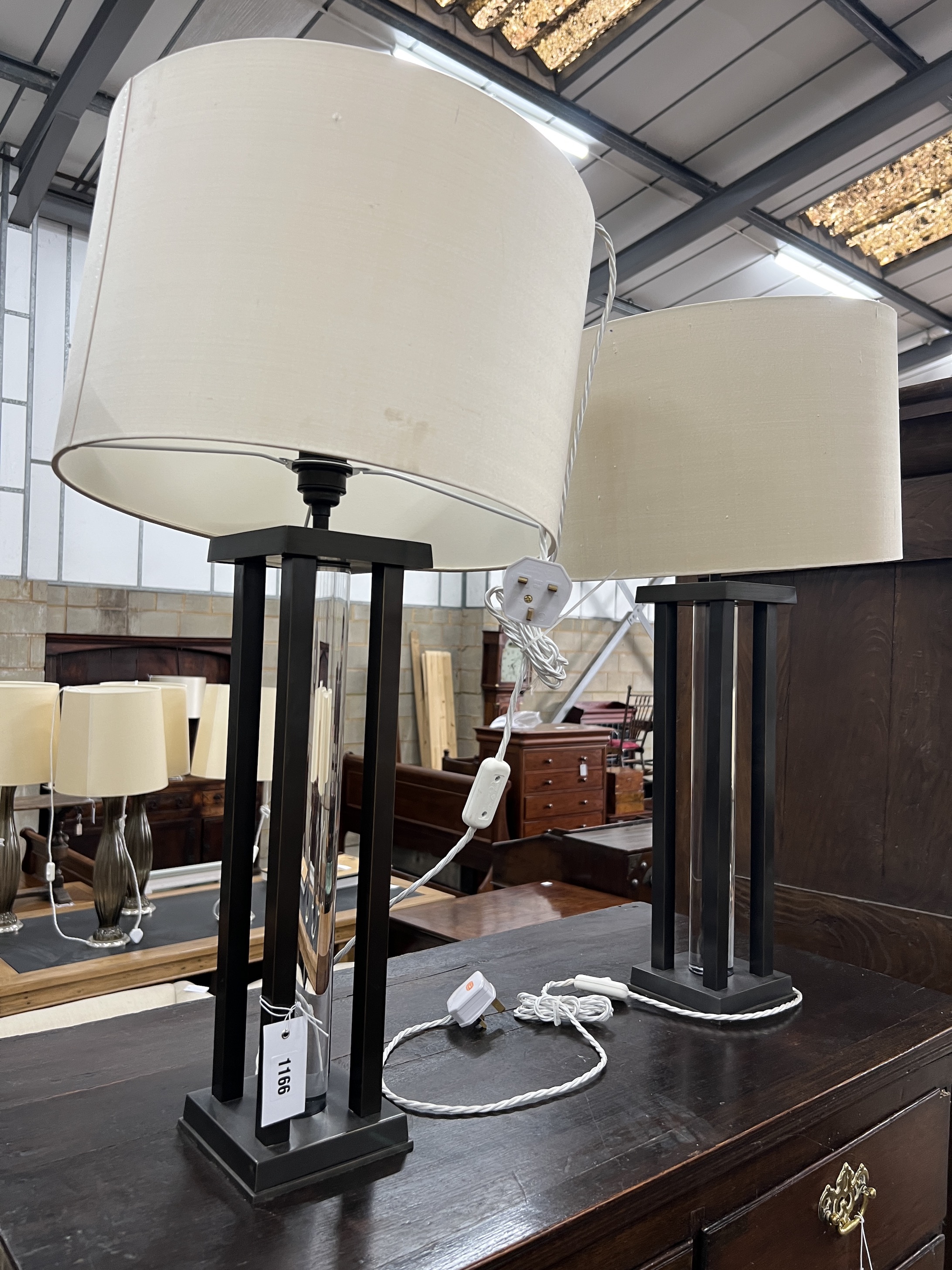 A pair of contemporary metal and perspex table lamps and shades, height 75cm including shades